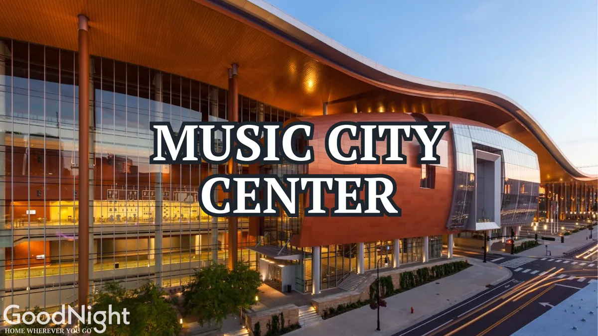 This image showcases the impressive exterior of the Music City Center, Nashville's major conference venue. The view includes the building's modern architecture framed by surrounding greenery and lively city streets, emphasizing its central location and accessibility.