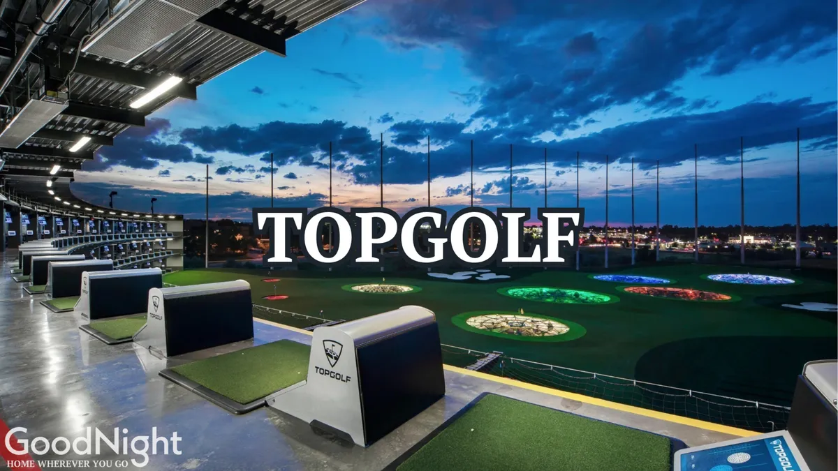 A vibrant Topgolf location with open-air golf bays overlooking colorful targets and Nashville’s skyline in the background. The setting is energetic, social, and modern, emphasizing group fun and unique experiences.